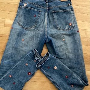 Flower embroidered distressed jeans